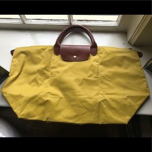 Longchamp travel tote bag. Brand New .. never worn